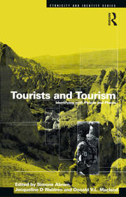 Tourists and Tourism: Identifying with People and Places book cover