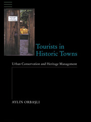 Tourists in Historic Towns: Urban Conservation and Heritage Management book cover