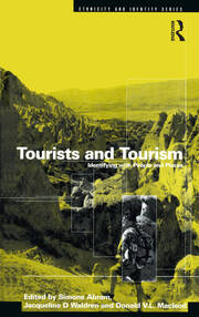 Tourists and Tourism: Identifying with People and Places book cover